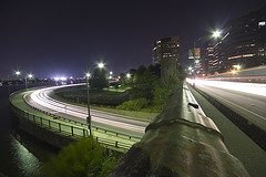 bridge with traffic flowing on it at night showing the flow