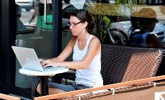 business website management - photo woman working on laptop